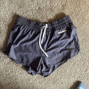Vuori Purple Athletic Shorts with Elastic Waistband and Quick-Dry Fabric